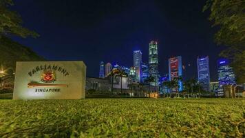 View over illuminated Singapore skyline at night photo