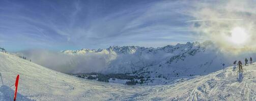 View on snow covered mountains in Austria photo