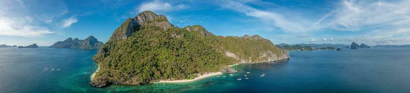 Drone panorama of the paradisiacal Seven Commandos beach near El Nido on the Philippine island of Palawan photo