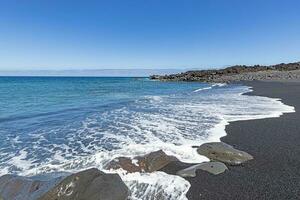 Picture over the black beach Playa del Paso near El Golfo on Lanzarote photo