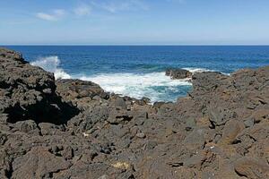 Picture over volcanic coast near El Golfo on Lanzarote photo