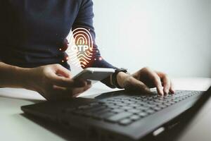 Verification of information with finger print by smart phone, Internet security, online financial transaction, 2-step verification, confirm transaction and identity. photo