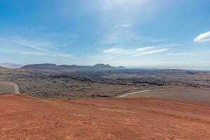 Panoramic view over the barren volcanic Timanfaya National Park on Lanzarote photo