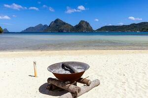 Impression of the paradisiacal Maremegmeg beach near El Nido on the Philippine island of Palawan during the day photo