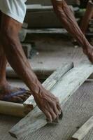 connecting and nailing wood with simple and manual tools. photo