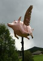 When Pigs Fly Whimsical Outdoor Sculpture photo
