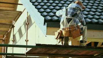 Industrial Worker Finishing Ceramic Roof Tiles Cover. Last Check. Caucasian Contractor in His 30s. video