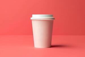 empty paper cup with coffee on pink background, mockup copy space photo