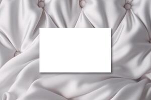 mockup white paper on silk cloth photo