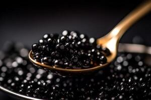spoon with black sturgeon caviar, delicates fish food photo