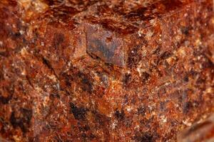 Macro mineral stone Garnet on a white background photo