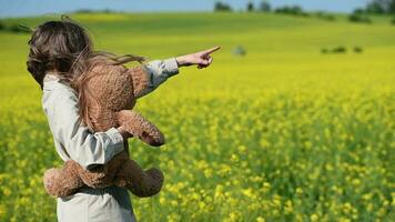 Girl With Medical Mask On Standing On Flowering Farmland video