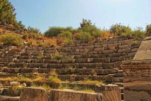 old ruins of the ancient temple of Athena in Priene in Turkey on a hot summer day photo