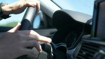 Driver with Hands on a Car Steering Wheel in Slow Motion video