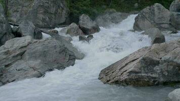 Mountain River and the Large Boulders. Scenic River in Slow Motion video