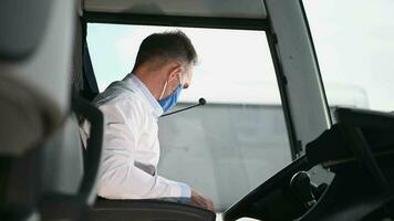 Caucasian Male Public Transit Driver With Protective Mask video