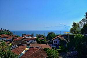 urban landscape on old city of turkish antalya with hot summer day with blue sky photo