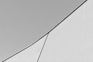 modern original fragments of architecture against the blue sky creating an interesting background photo