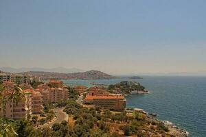Turkish port city of Kusadasi on the Mediterranean Sea on a warm summer sunny day, photo