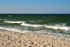 landscape of the blue Baltic sea in Poland and the beach on a sunny warm day photo