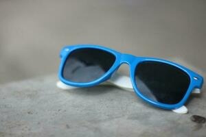 glasses with blue frames with black glasses photo