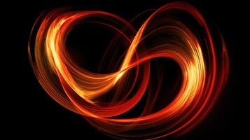 A red and yellow colored swirls on the black background. photo