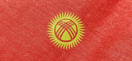 Kyrgyzstan fabric flag cotton material wide flags wallpaper colored fabric Kyrgyzstan flag background photo