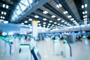 Blurred images of Self-service check-in machine at Check-in counters at Suvarnabhumi International Airport photo