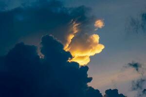 Black clouds before the storm and the rain, big white clouds in the blue sky, Nimbostratus clouds, an altostratus cloud photo