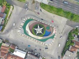 Bogor, Indonesia - 2022. aerial view of Tugu Pancakarsa in the morning at the crossroads photo