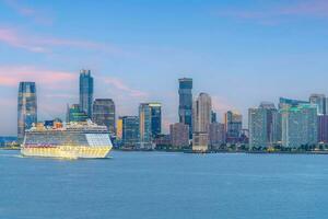 Cityscape of Jersey City skyline  from Manhattan NYC photo