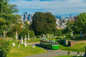 View of Green Wood cemetery in Brooklyn with Manhattan city skyline photo