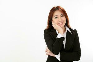 Young attractive Asian woman on white background hand on cheek happy look at camra photo