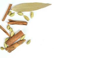 Bay leaf Cinnamon cardamom spice border photo