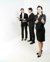 Young Asian man woman wearing business office suit stand white background photo