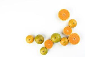 small yellow green mandarin orange whole slice on white background copy space for text frame border photo