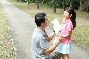 South East Asian young father mother daughter son parent boy girl child activity photo