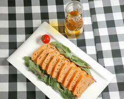 Meatloaf slice red chard leaf photo