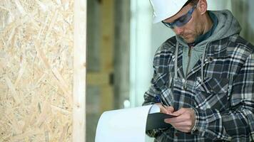 Construction Inspector Makes Notes Of Improper Installations Needed Fixing. video