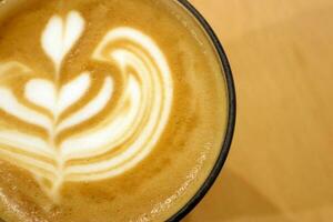 Coffee latte on table yellow brown surface photo