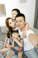 Parent mother father little child boy girl brother sister camera self portrait selfie photo