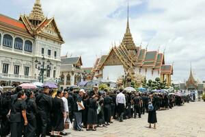 Bangkok, Thailand- June 28, 2017- People queuing at the yearlong period of mourning to pay their last respect to late Thai King Bhumibol Adulyadej. photo