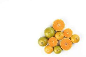 small yellow green mandarin orange whole slice on white background copy space for text frame border photo