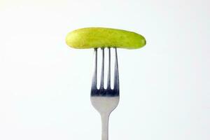 Small mini fresh green cucumber photo