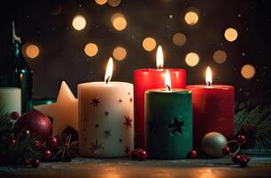 Burning candle and Christmas decoration over snow and wooden background. . photo