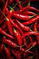 Red hot chilli peppers pattern texture background. Close up. A backdrop of Red hot chilli peppers. . photo