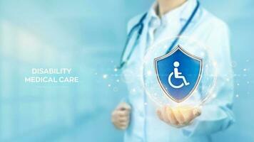 Disability medical care. Disability insurance. Medical rehabilitation concept. Handicapped patient help. Doctor holding in hand protection shield with person on wheelchair icon. Vector illustration.