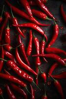Red hot chilli peppers pattern texture background. Close up. A backdrop of Red hot chilli peppers. . photo