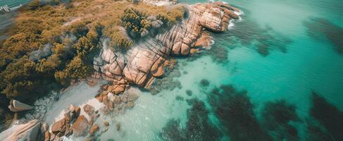 Beach and waves from top view. Turquoise water background from top view. Summer seascape from air. Top view from drone. Travel concept and idea. . photo