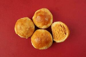 Tambun biscuits small Tau Sar Pneah famous Bukit Tambun Penang delicacies on red background photo